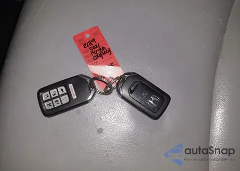 2021 Honda Odyssey Touring from USA, damaged, VIN 5FNRL6H8XMB002177